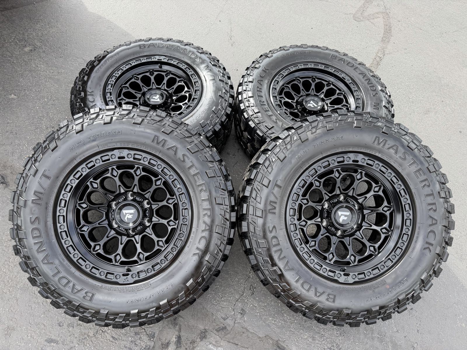 New Fittipaldi FT101 Black 6x5.5 LT285/70r17 MT Chevy Silverado 1500 GMC Sierra Toyota Tacoma Ford Ranger wheels and tires 6 lug