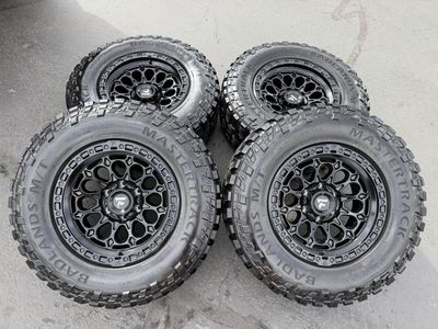 New Fittipaldi FT101 Black 6x5.5 LT285/70r17 MT Chevy Silverado 1500 GMC Sierra Toyota Tacoma Ford Ranger wheels and tires 6 lug