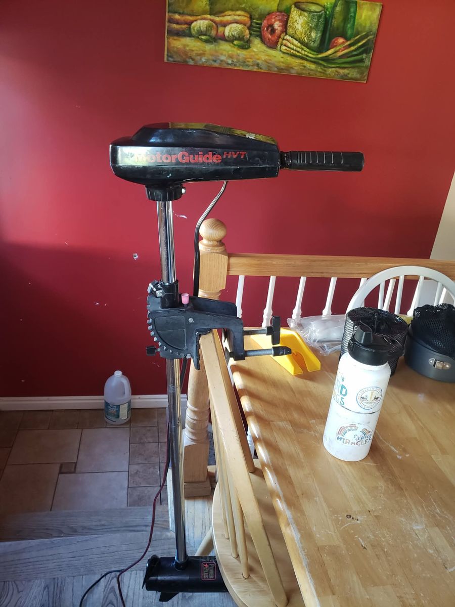 MotorGuide 30 pound thrust transom mounted trolling motor with brand new battery, $225 obo