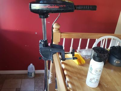 MotorGuide 30 pound thrust transom mounted trolling motor with brand new battery, $225 obo