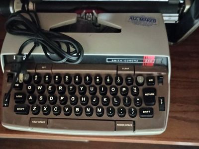 Smith-Corona 250 Portable Electric Typewriter - All Maker Ribbon Compatible