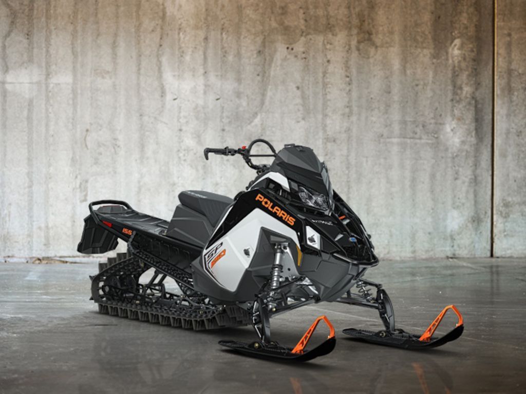 2027 Polaris® 650 RMK SP 155 ES White Lightning / Gloss Black / Orange Burst