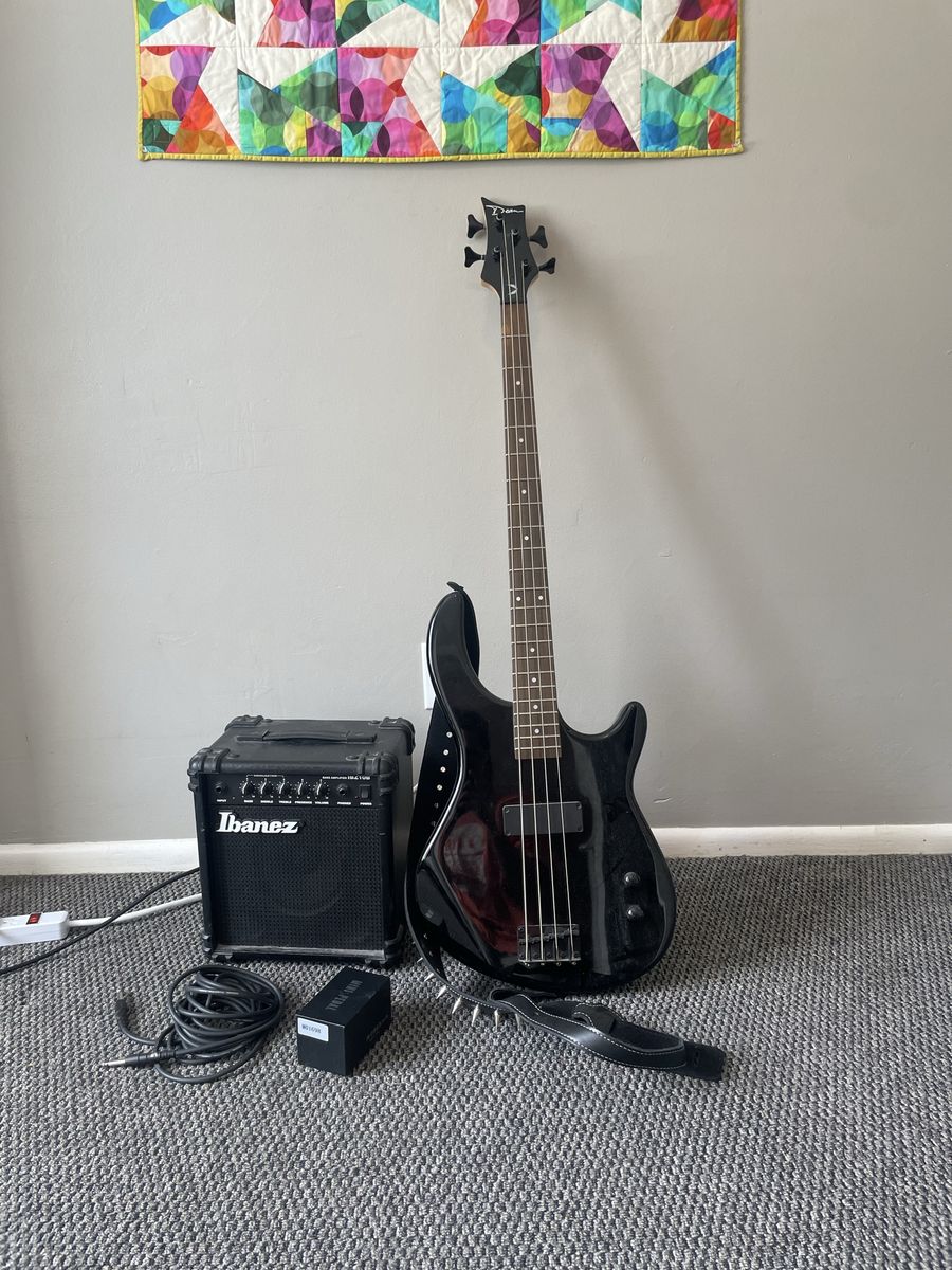 Bass guitar, strap, amp, aux, and loop pedal