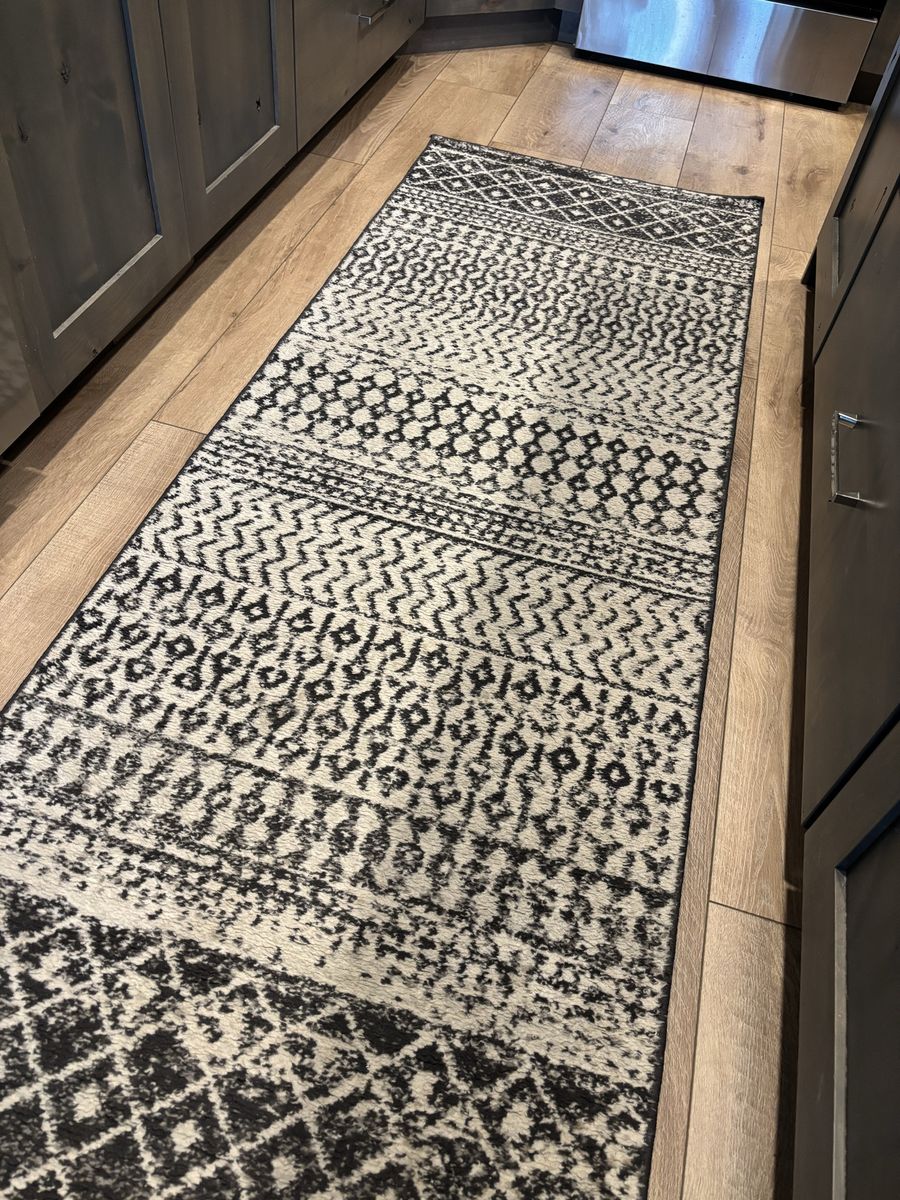 Black, White and Grey Runner
