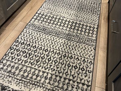 Black, White and Grey Runner