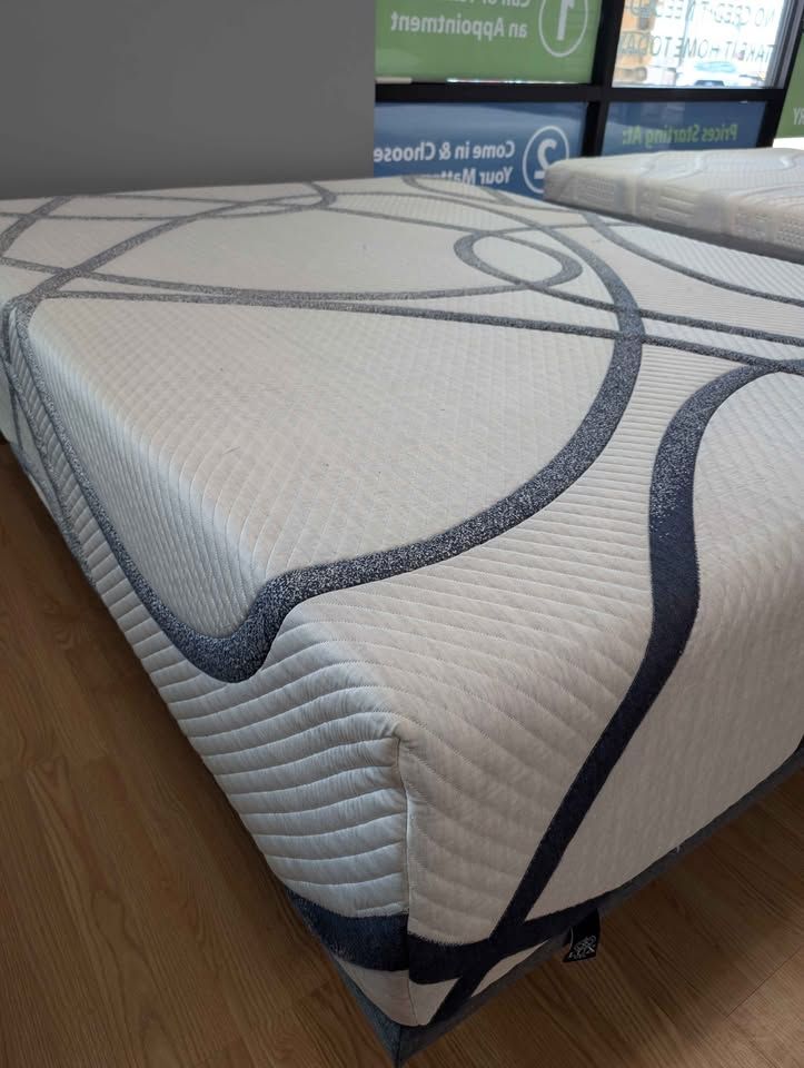 Queen Mattress. Comparable to Tempur-Pedic (but priced much lower) - floor model