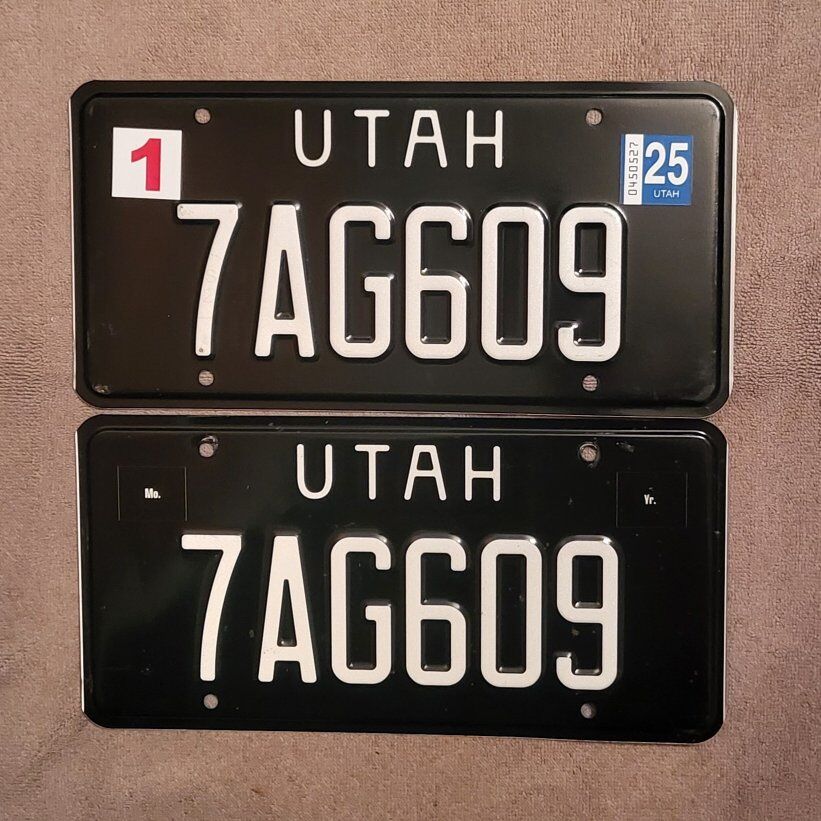 Pair of black and white Utah license plates