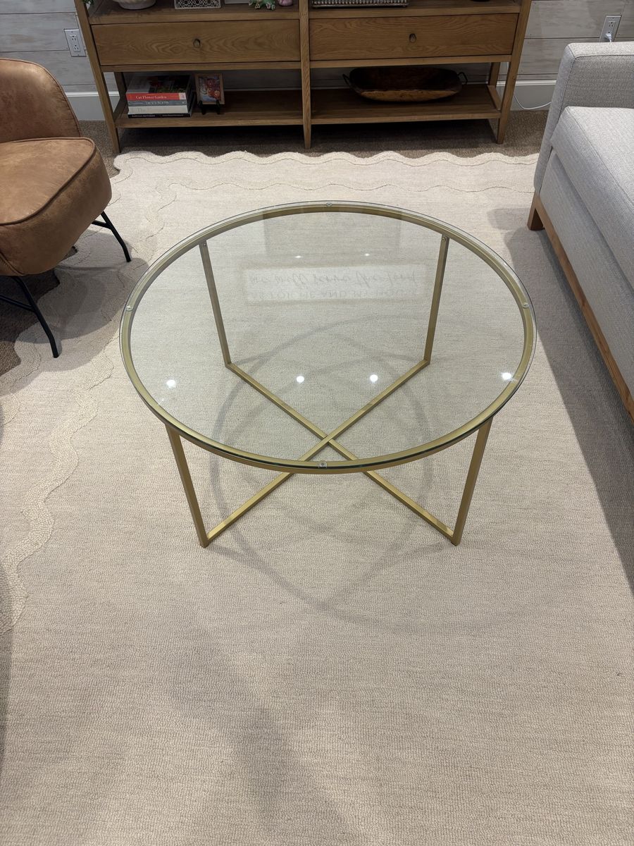 Glass topped coffee table