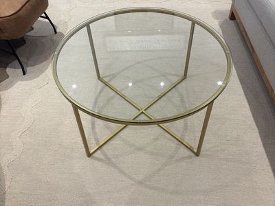 Glass topped coffee table