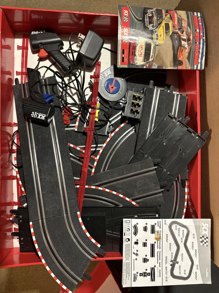 SCX Compact Slot Car Racing Track Set with Controllers and Accessories