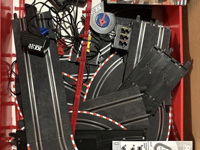SCX Compact Slot Car Racing Track Set with Controllers and Accessories