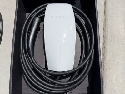 Tesla Wall Connector Electric Vehicle Charger with roughly 30’ of wire