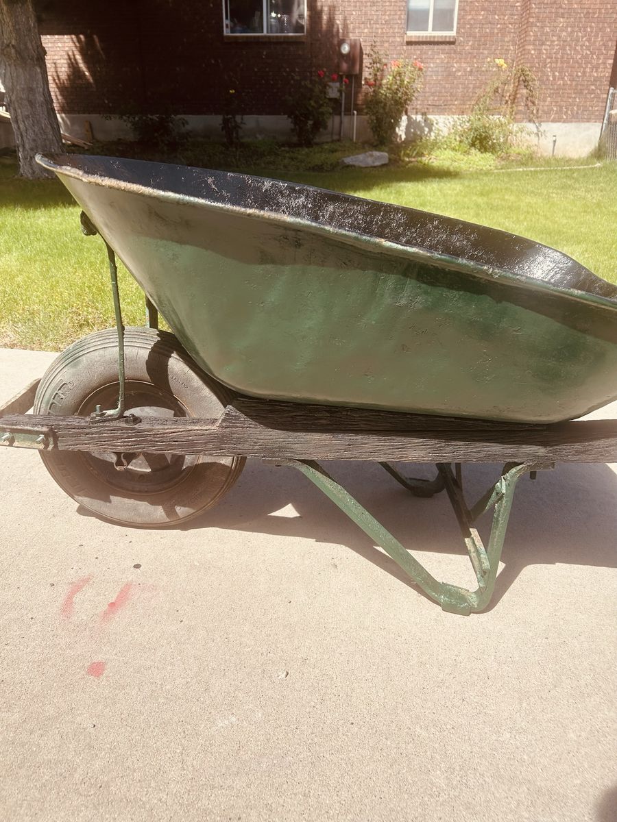 Vintage Green Metal Wheelbarrow