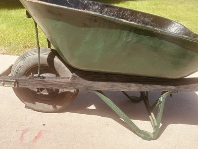Vintage Green Metal Wheelbarrow