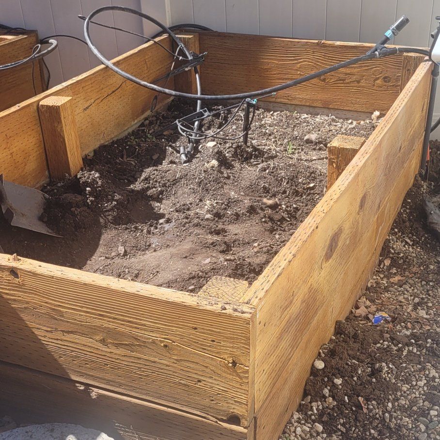 wood garden bed and soil