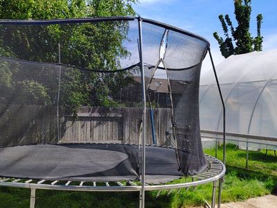 Large Outdoor Trampoline with Enclosure - Great for Family Fun!