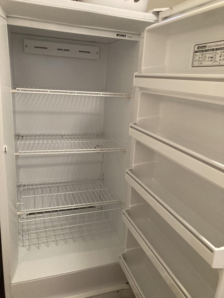 Frost-free upright freezer, 1997 Kenmore one-door.