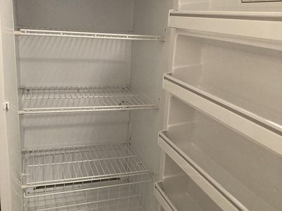 Frost-free upright freezer, 1997 Kenmore one-door.