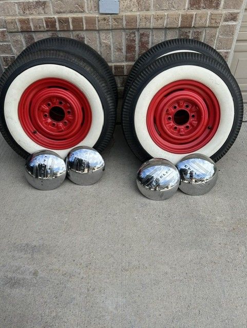 Vintage 6.70 x 15 White Wall Tires with Red Rims and Hubcaps