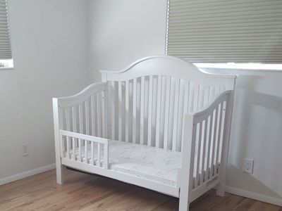 White Wood Toddler Bed with Safety Rail - Converts from Crib