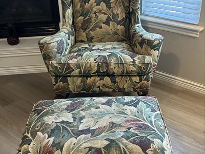 Large cosy chair with ottoman.