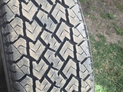 Set of Kelly Safari AWR Tires on Aftermarket Custom Wheels / Rims