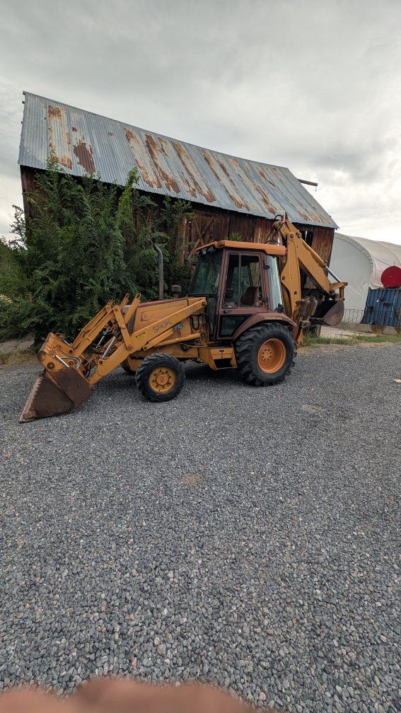 Case 580K  turbo Backhoe Loader Tractor with extendahoe and 4 in 1 bucket