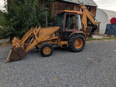 Case 580K turbo Backhoe Loader Tractor with extendahoe and 4 in 1 bucket