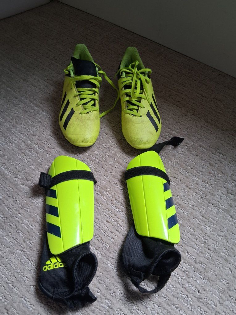 Adidas cleats and shin guards
