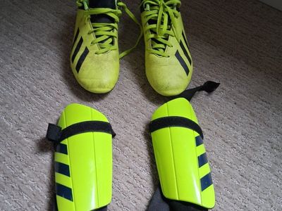 Adidas cleats and shin guards