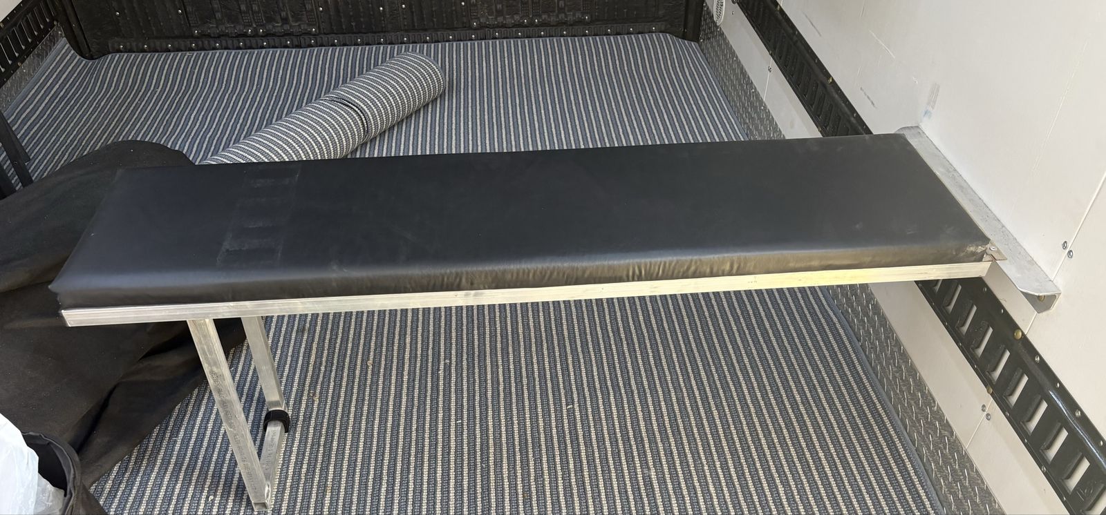 Folding Wall-Mounted Aluminum Bench with Black Padded Seat