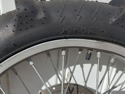 Rim and a ten paddle tire