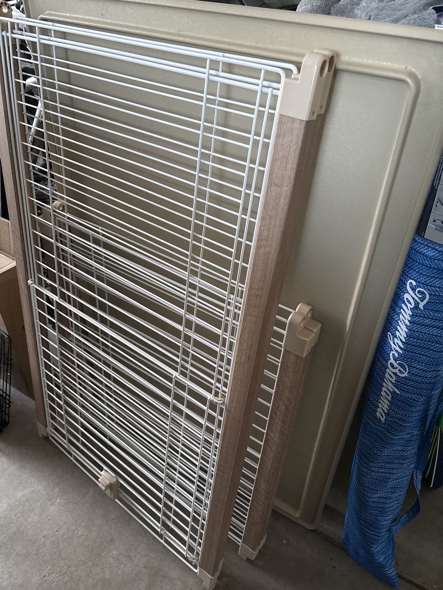 White pet crate (in back)