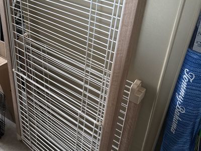 White pet crate (in back)