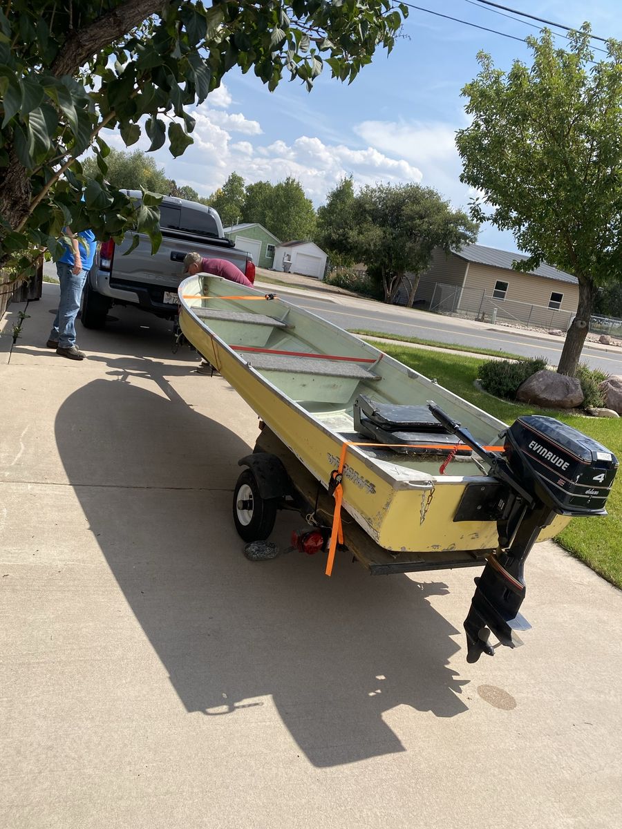 StarCraft 14 foot John boat with motor and trailer 