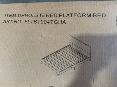 Grey Twin size upholstered platform bed