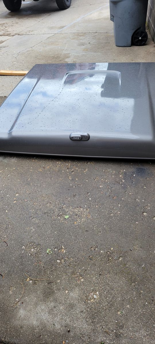 A sleek, one-piece fiberglass cap that can be painted to match your truck and operates with a built-in handle and gas struts.