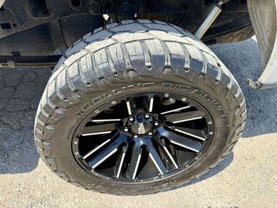 MOTO Metal 20" Black Wheels with 33” Rolling Big Power RT Tires (Set of 4)