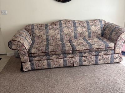 Vintage Floral Print Fabric Sofa with Rolled arms and love seat.