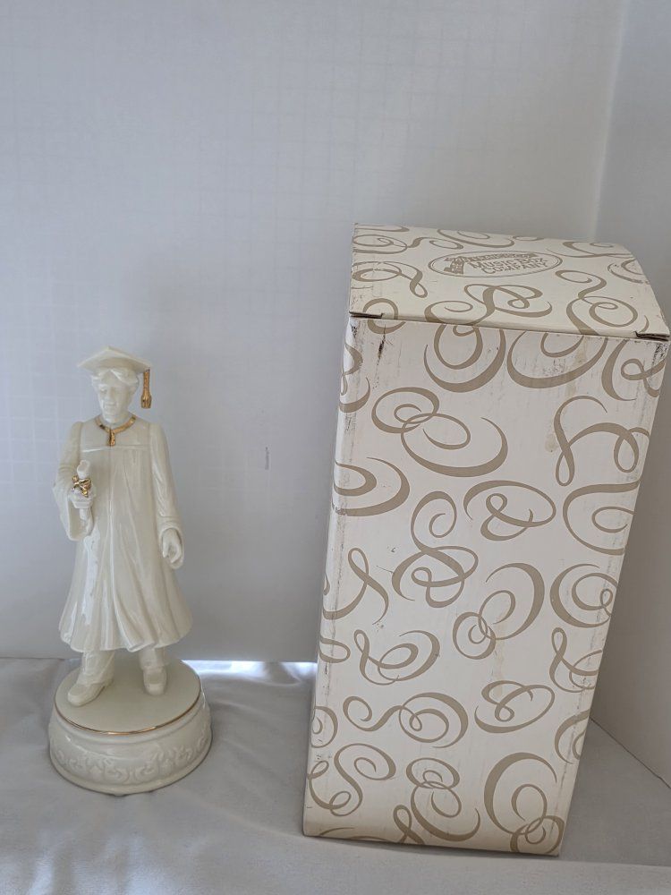 Vintage graduation figurine fromThe San Francisco Music Box Company