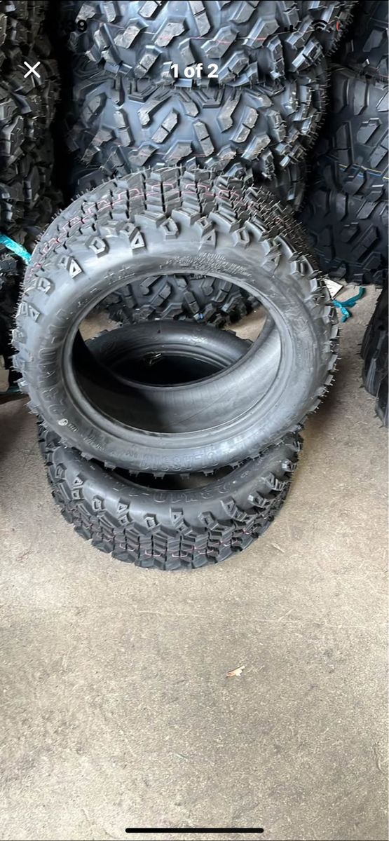 23X10-14 NEW PAIR OF EXCEL TIRES