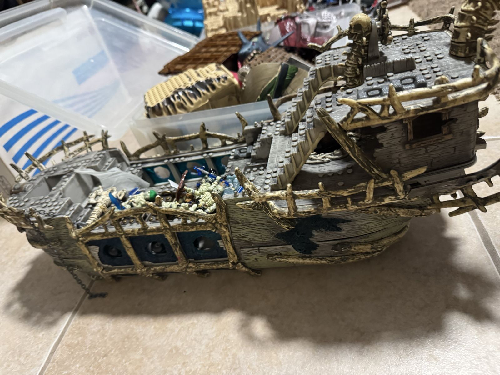 Pirate ships, mini figures, sharks, and other LEGO like pieces