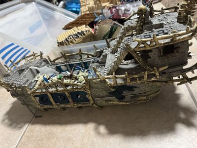 Pirate ships, mini figures, sharks, and other LEGO like pieces