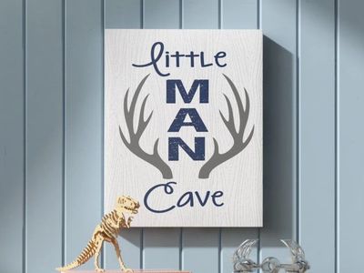 24" x 30" Little Man Cave Antlers by Stupell - Canvas Wrapped Artwork Boys Bedroom Decor