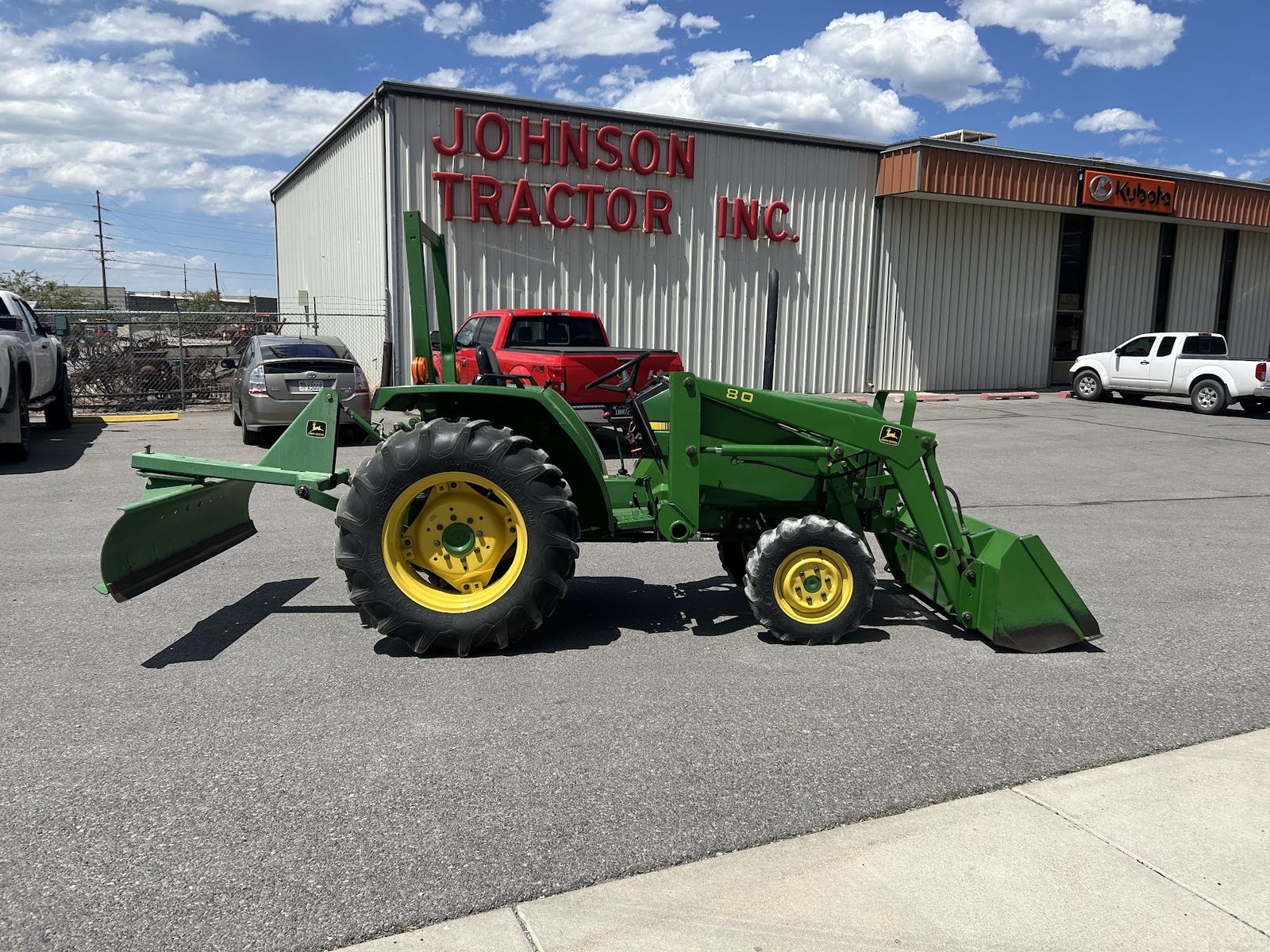 John Deere 870 Tractor with Front Loader, Rear Blade, Rotary Tiller, & Mower Package - Used Farm Equipment