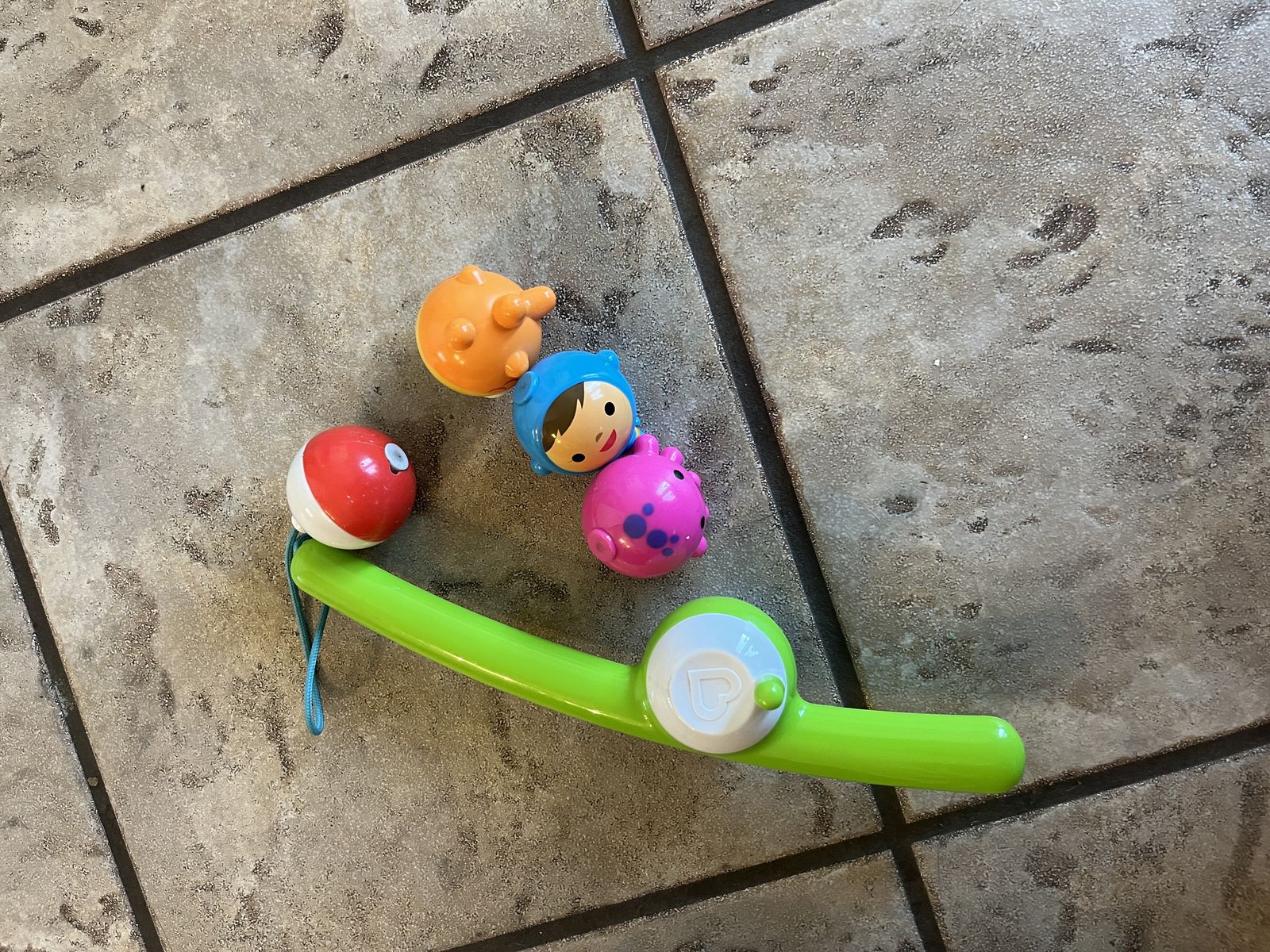 kids play fishing pole with magnetic bobber and 3 "fish"