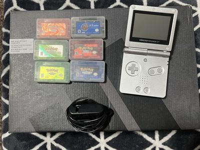 Nintendo Game Boy Advance SP Silver Console w/ Charger + 5 Pokemon games + Disney extreme skate adventure