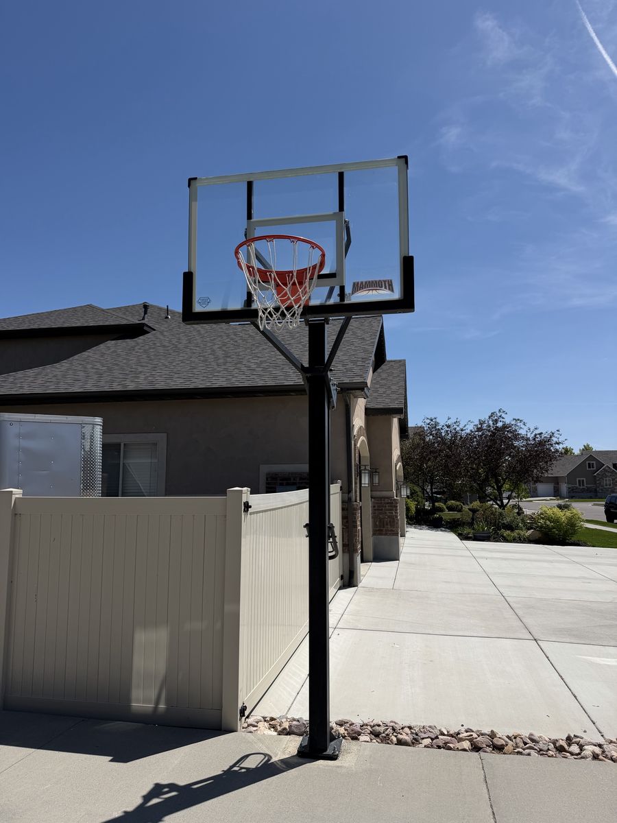 Adjustable basketball standard and hoop