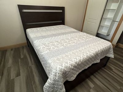 Dark Wood Bed Frame with Slatted Headboard and mattress