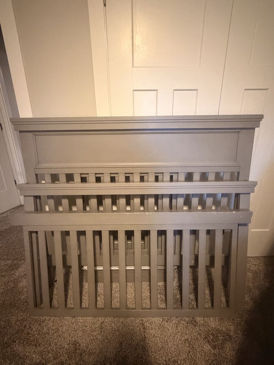 Gray Wooden Baby Crib with Slat Design